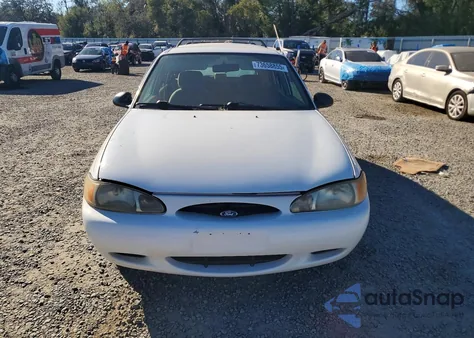 1997 Ford Escort Lx z USA, uszkodzony, nr VIN 3FALP15P3VR110638